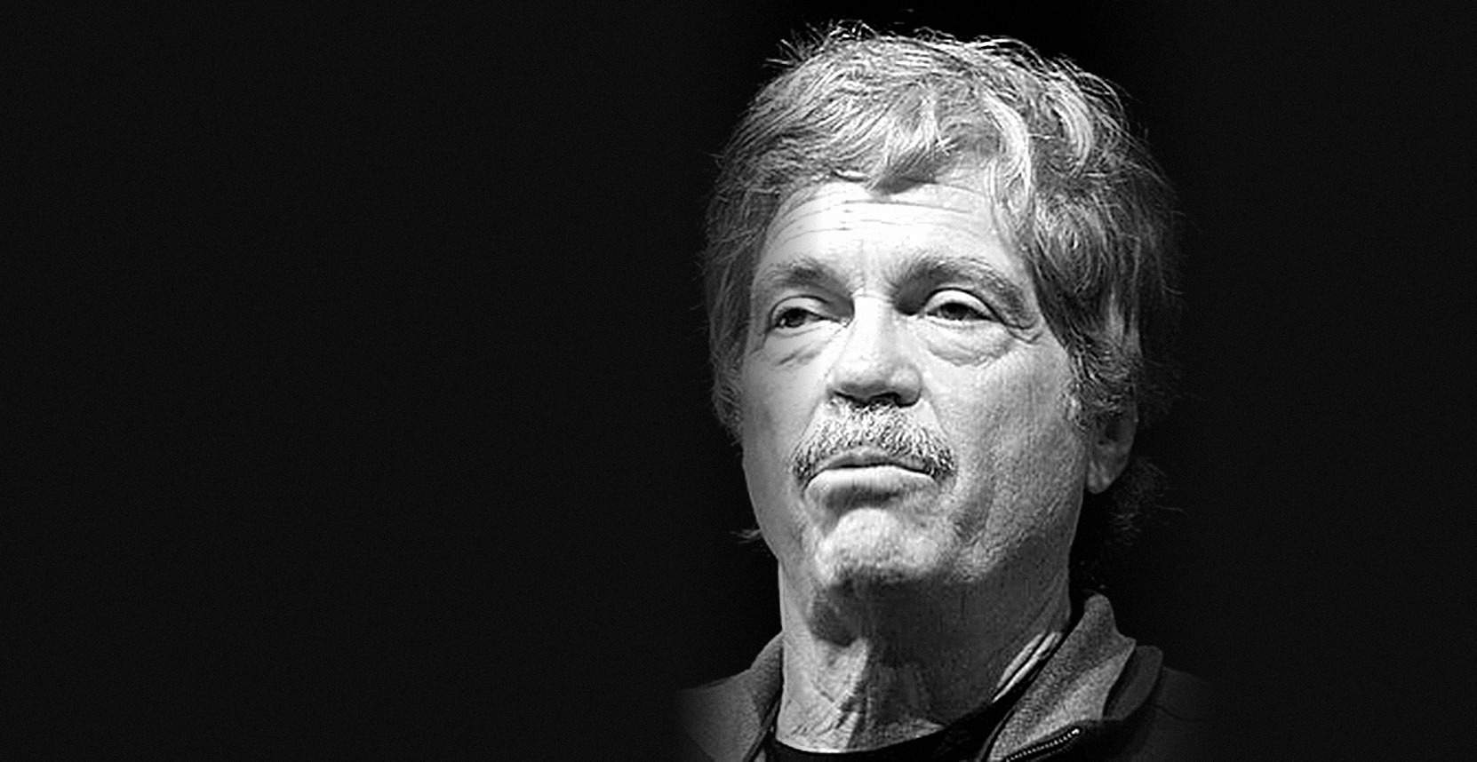Retrato en blanco y negro de Alan Kay